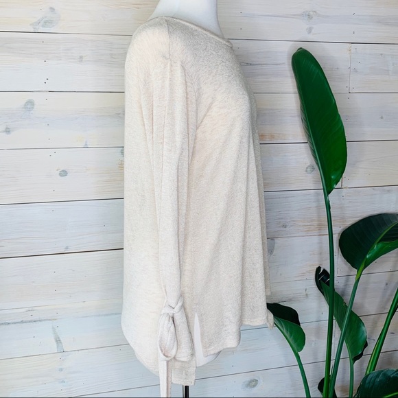 SOLD! Light Cream Colored Soft Knit Top with Cute Detailing Around Wrist - Picture 2 of 6